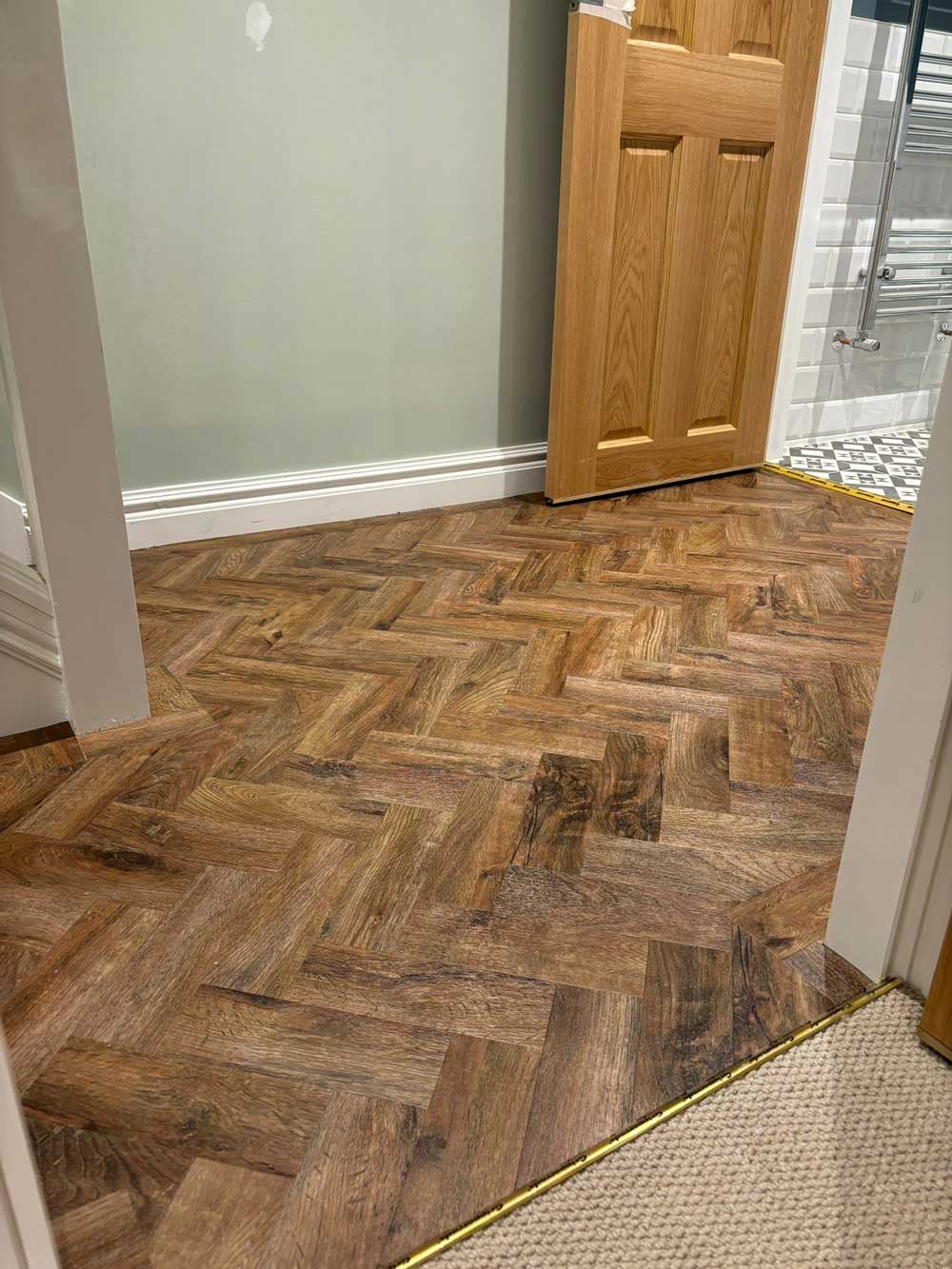 Dark oak herringbone LVT