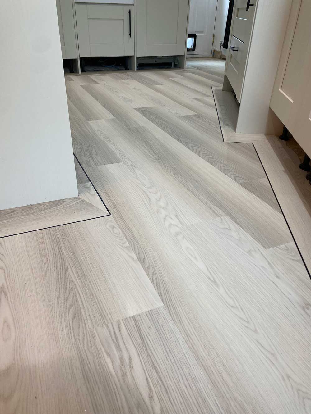 Grey herringbone LVT