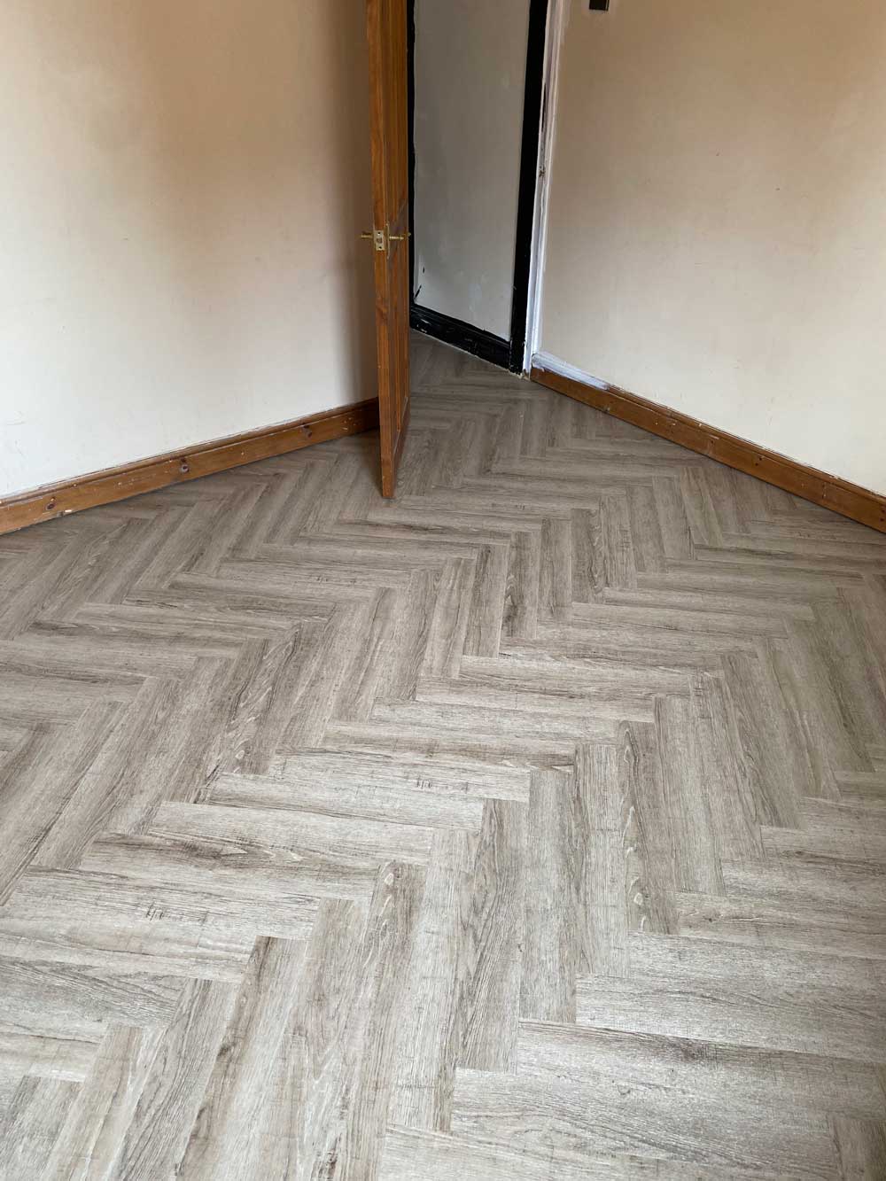 Pale herringbone LVT